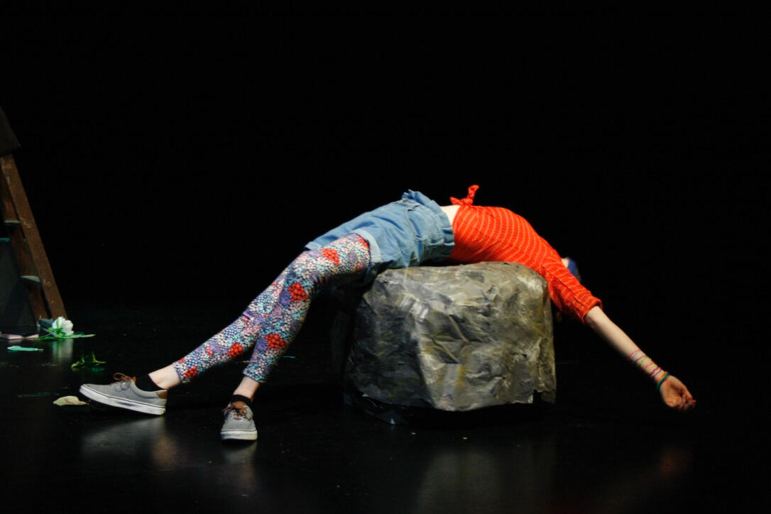 one character in Exit 7 dramatically splays over a rock